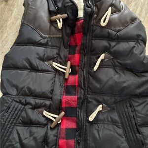 Black Puffer Jacket with Red Accents